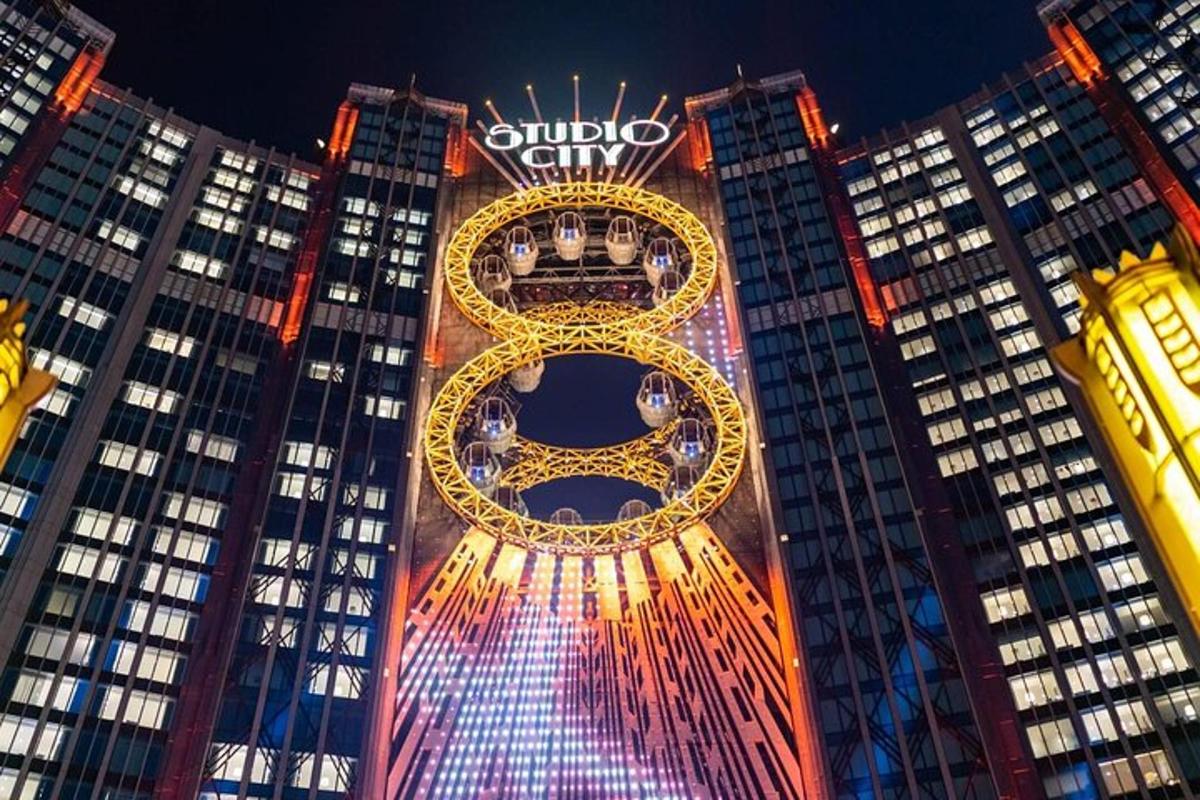 a building with a lit up sign on the side of it