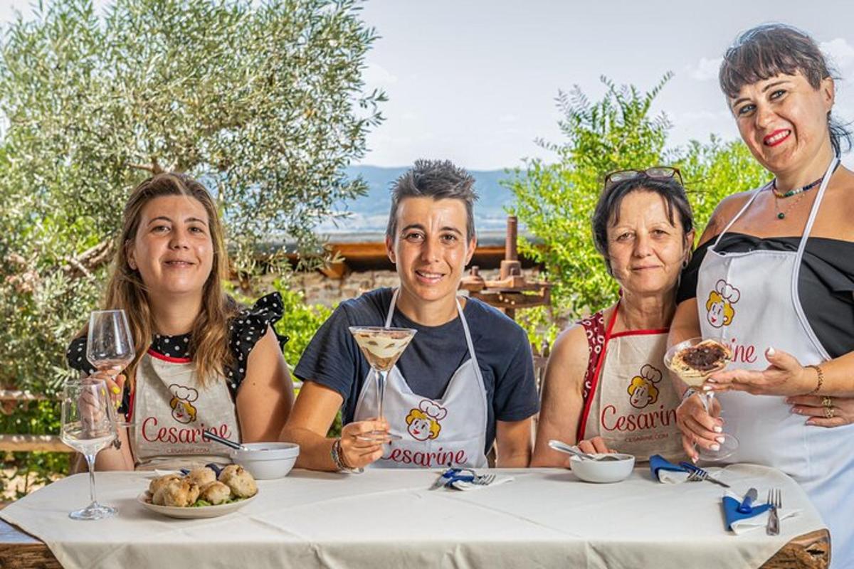 a group of people sitting at a table with wine glasses