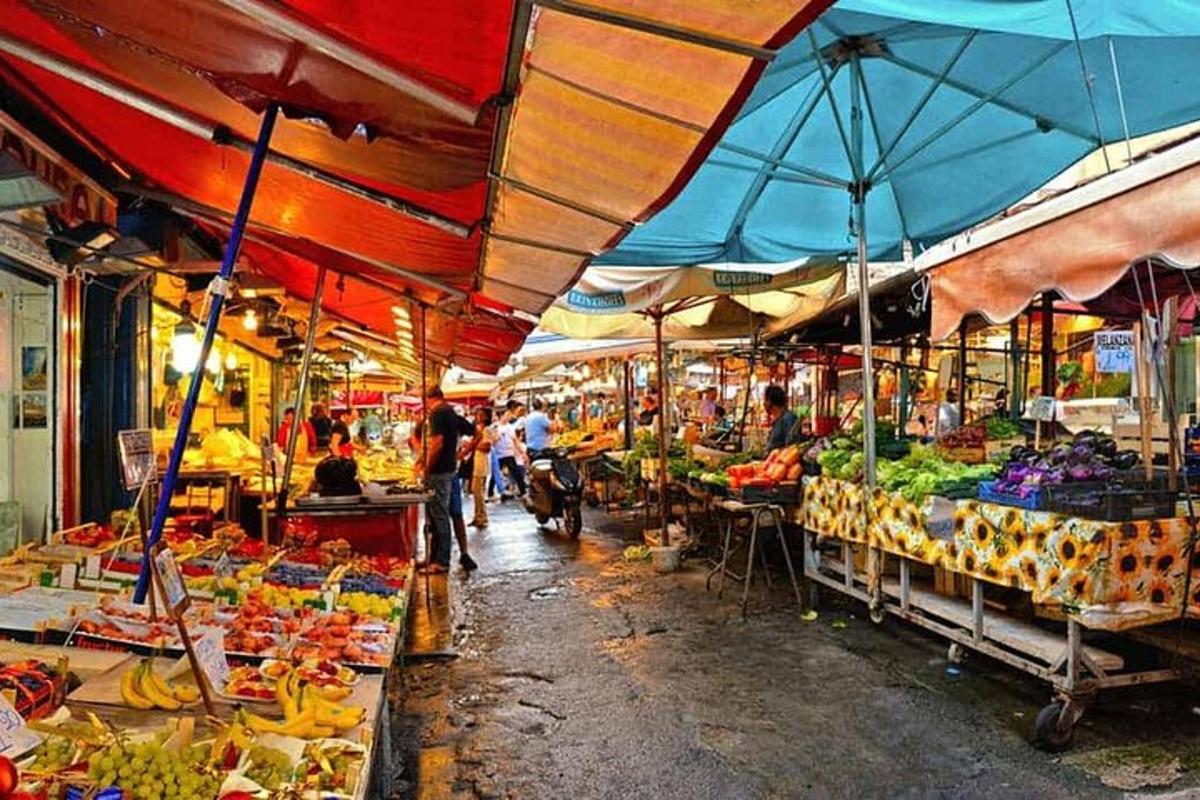 a market with a bunch of fruits and vegetables