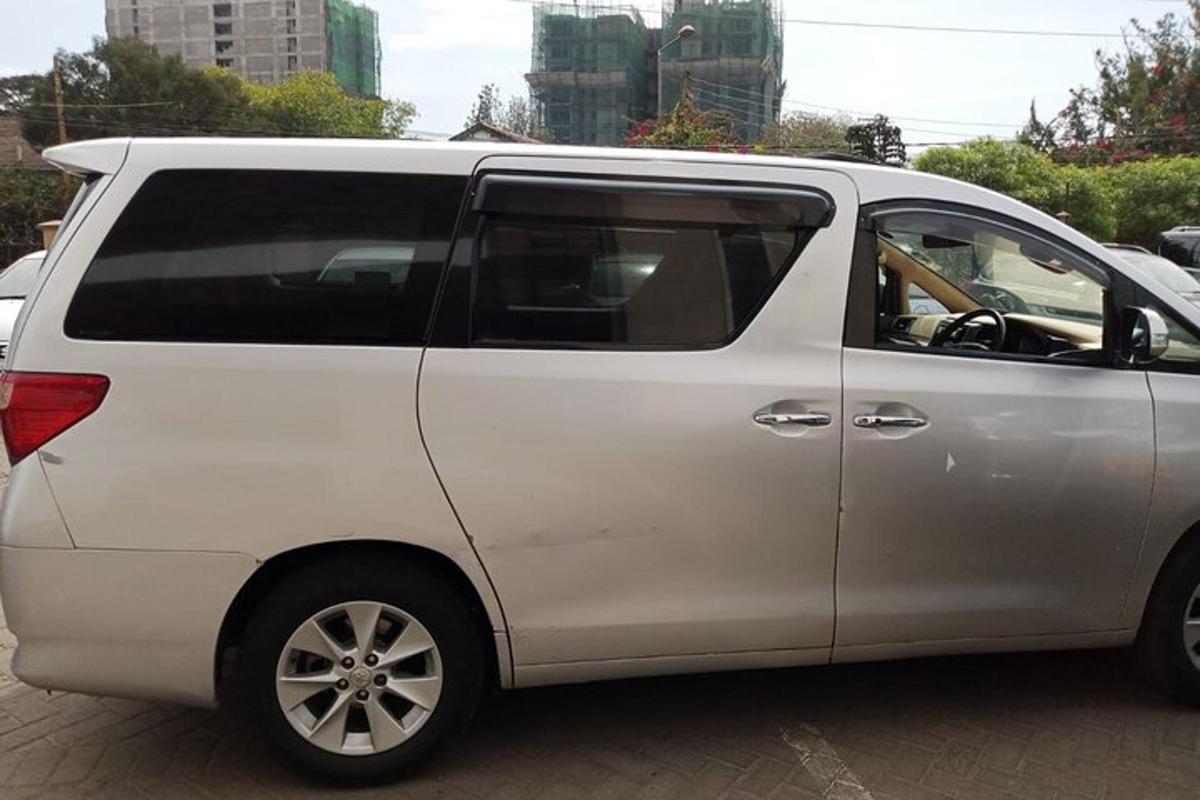 a white van parked in a parking lot