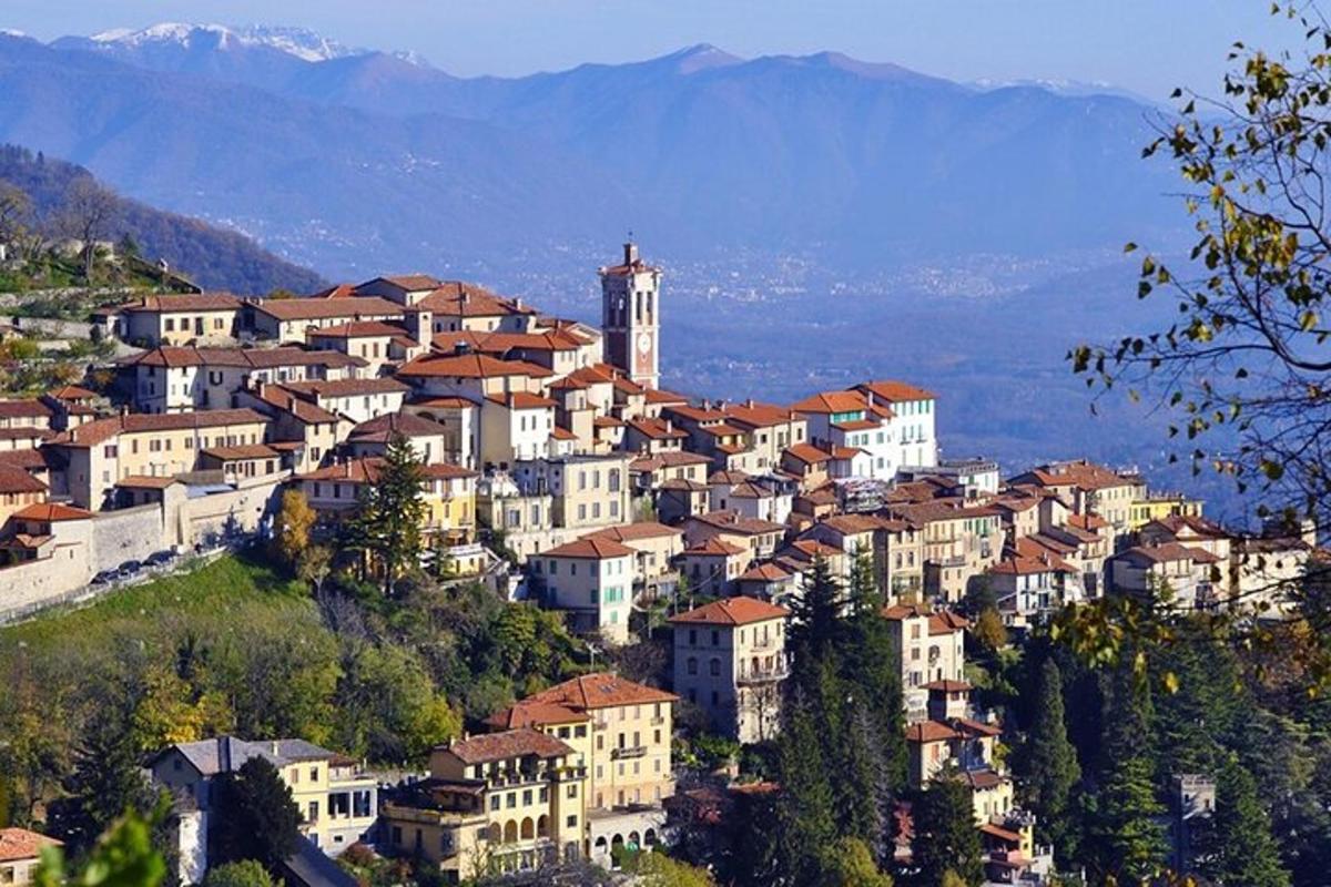 a town on top of a hill with houses