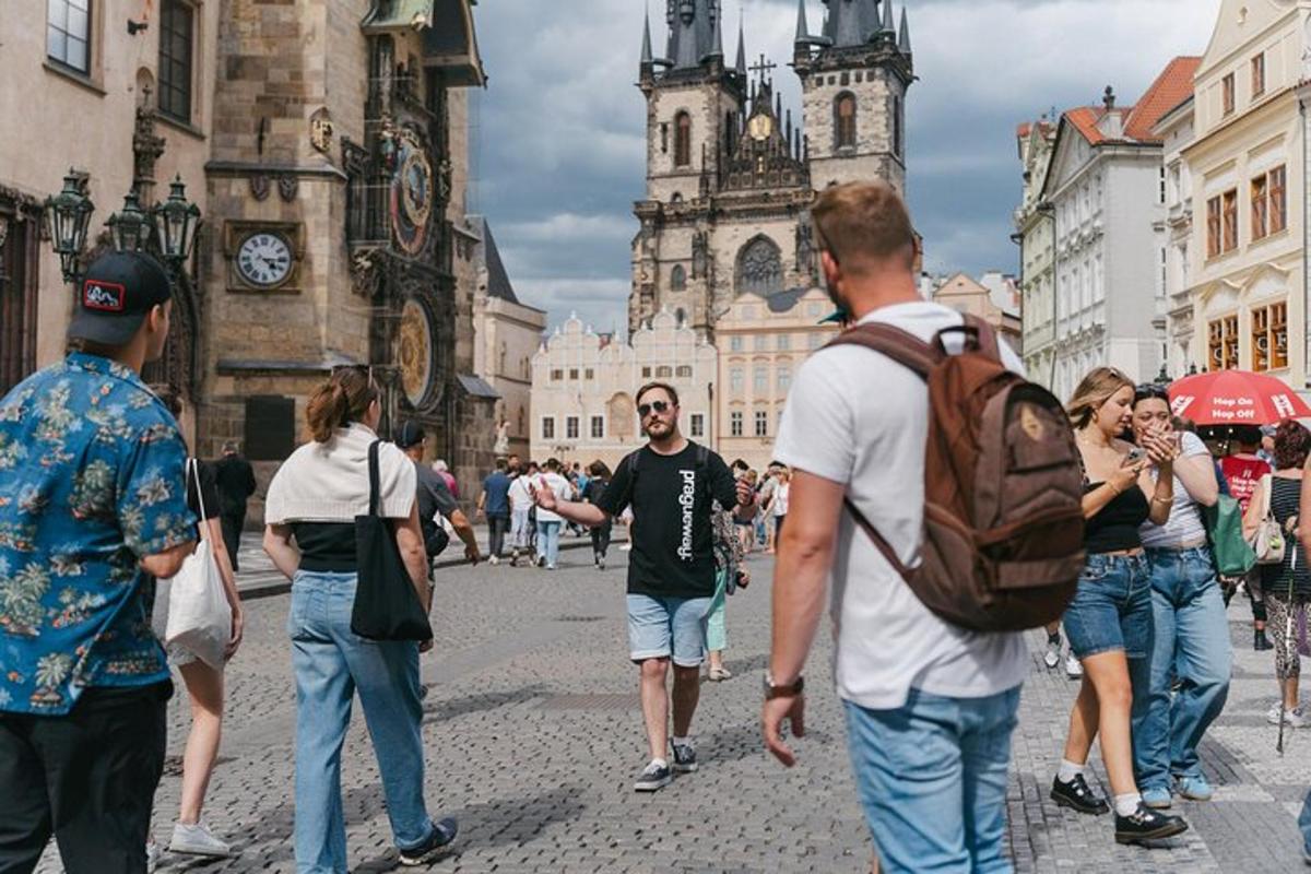 a group of people walking down a city street