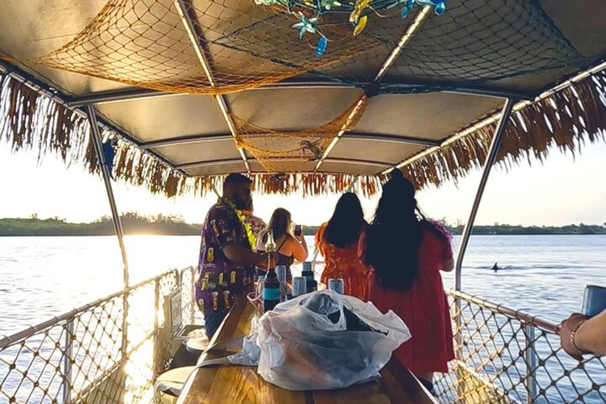 a group of people on a boat on the water