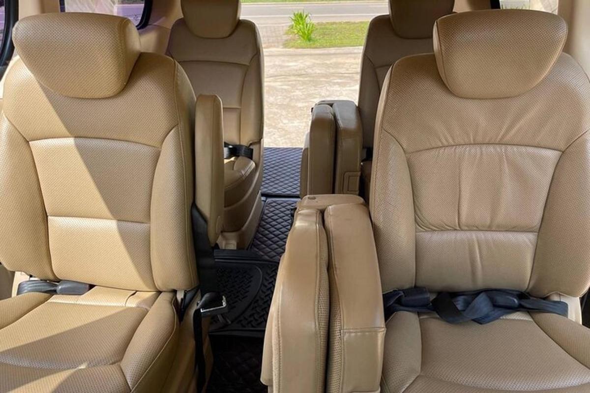 two empty seats in the back of a car