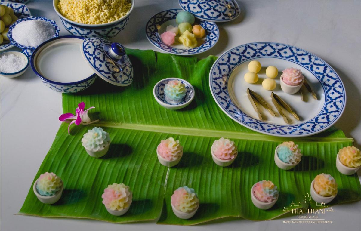 a table with a plate of food on a green tray