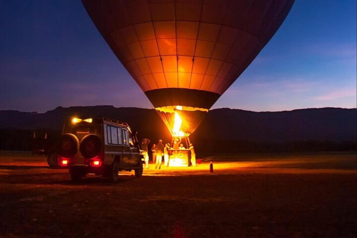 a hot air balloon with a group of people inside