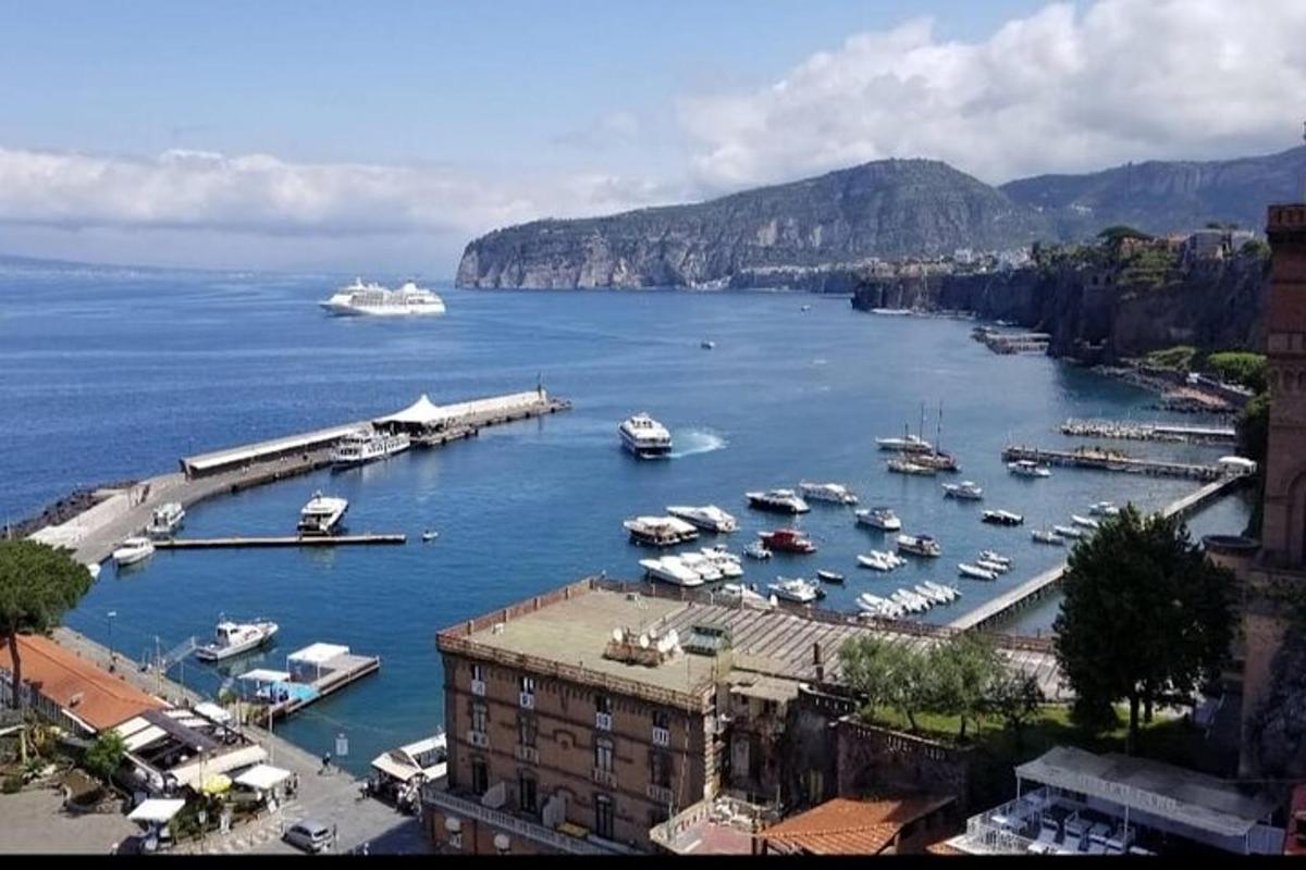 a view of a harbor with boats in the water