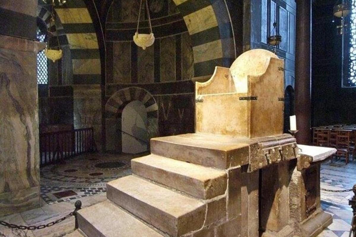 a set of stairs in a church with a room