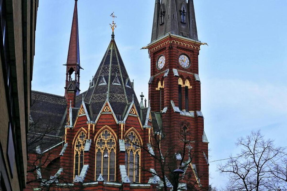 a large building with a clock tower with a sky