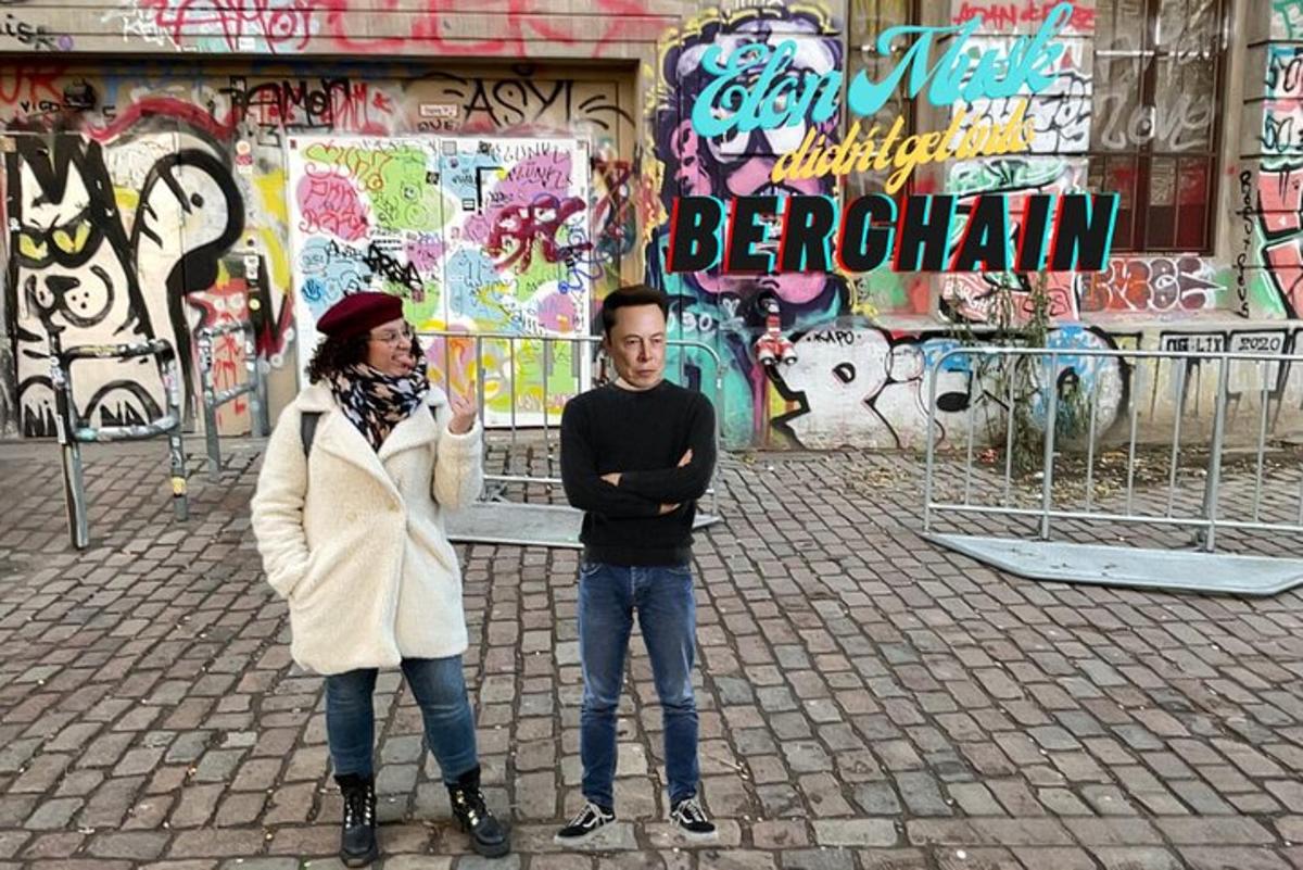 un uomo e una donna in piedi davanti a un edificio con graffiti