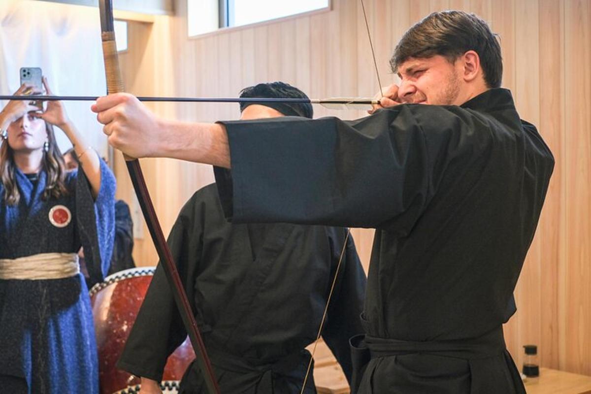 a man playing a violin in a orchestra