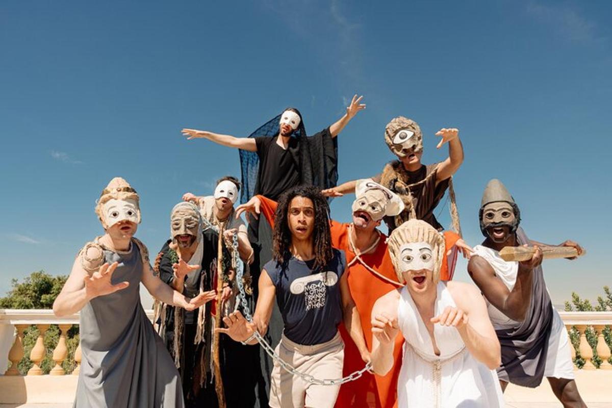 a group of people dressed in costumes posing for a picture