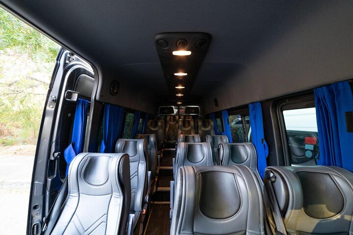 an empty bus with empty seats on a bus