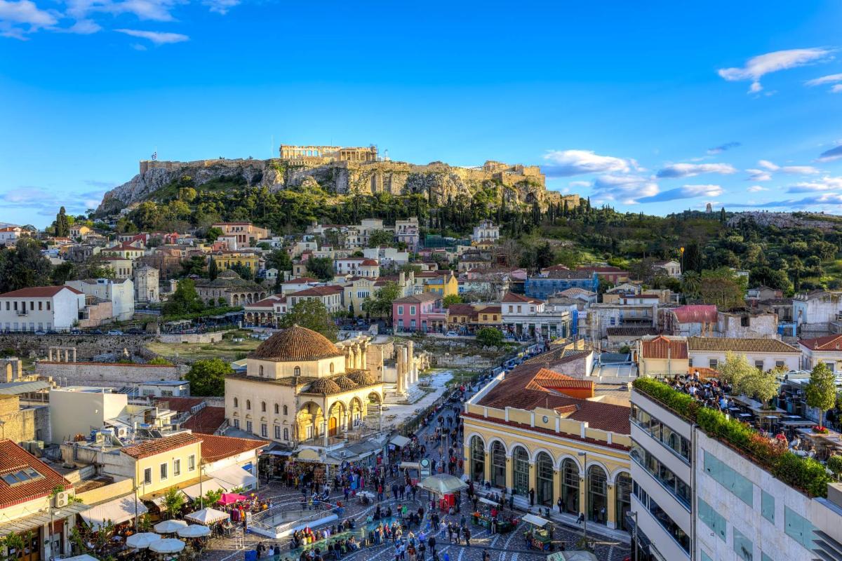 an aerial view of a city with a castle