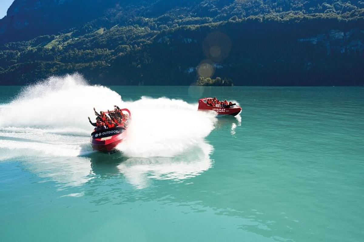 two boats in the water on a lake