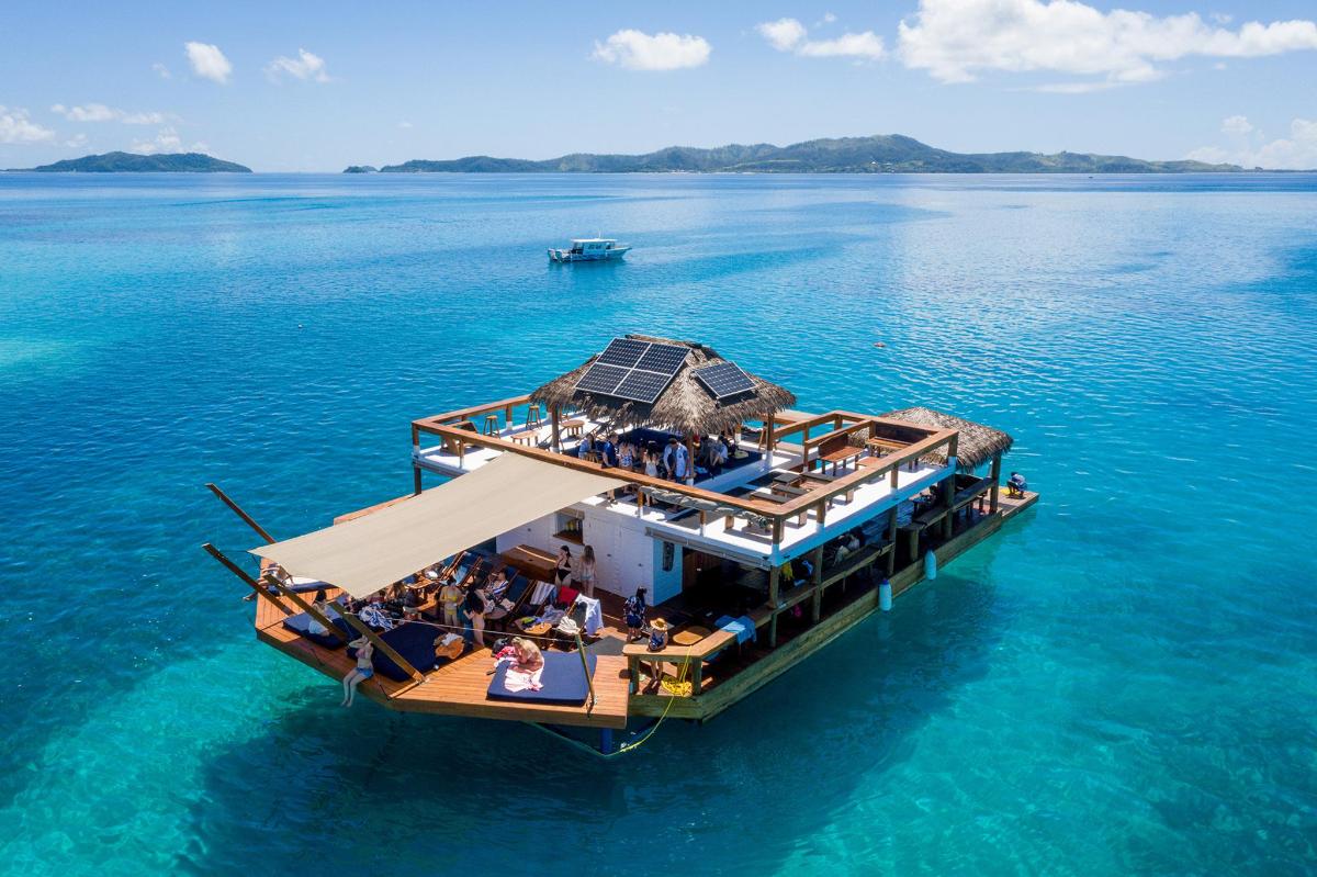 a boat in the water with people on it
