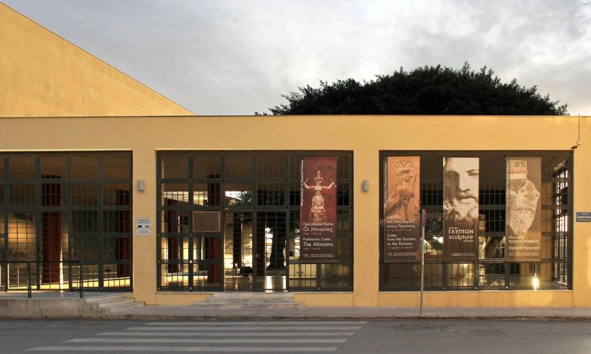 a building with signs in the windows of it