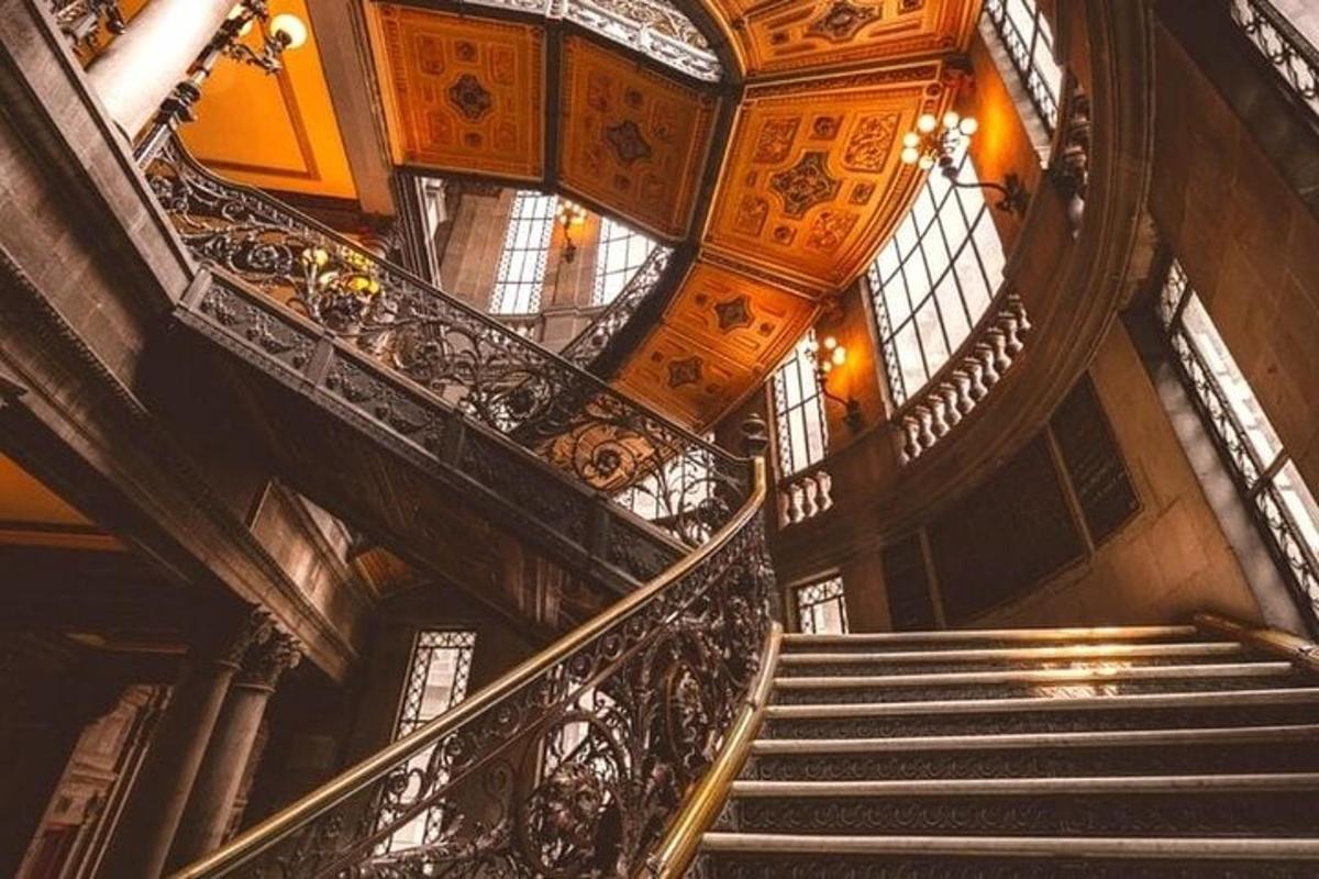 a spiral staircase in a building with a ceiling