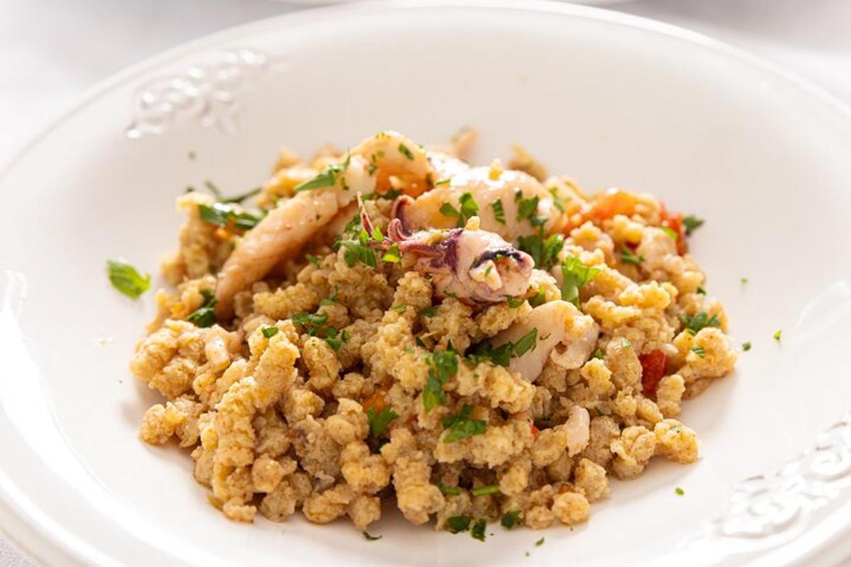 a white plate with a dish of food