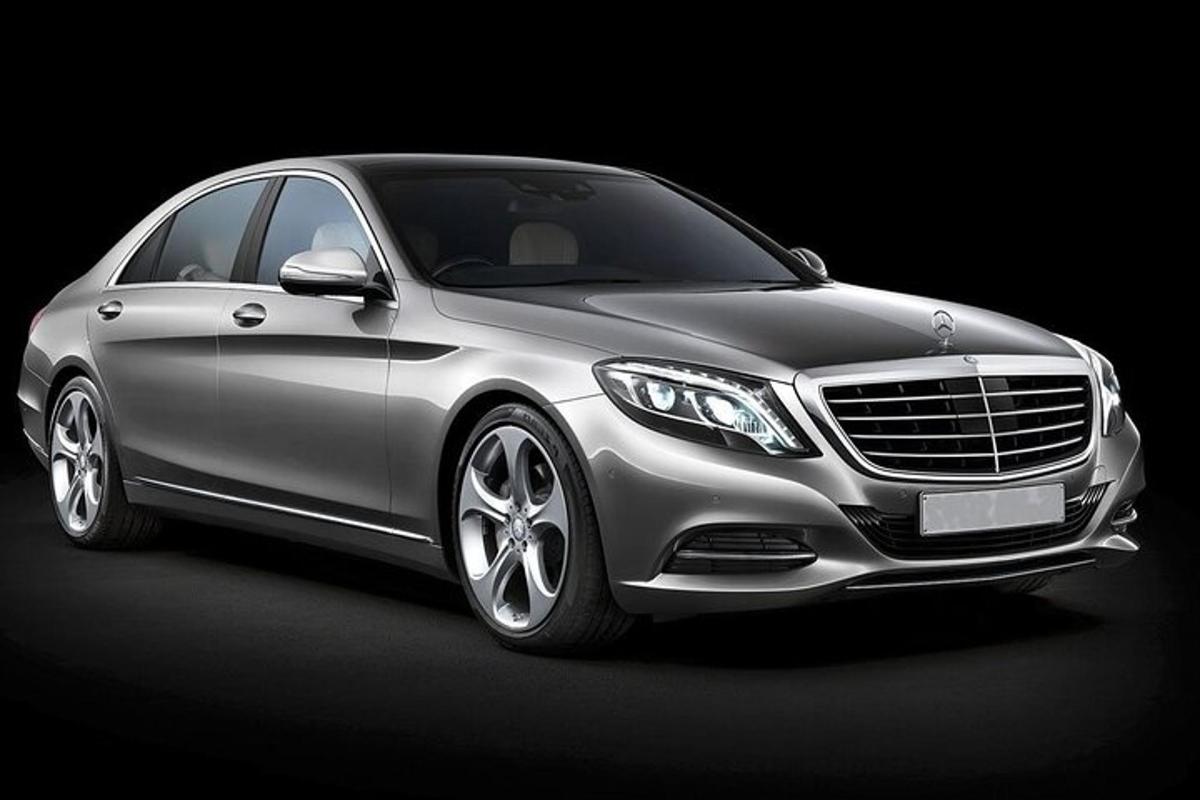 a silver car on a black background