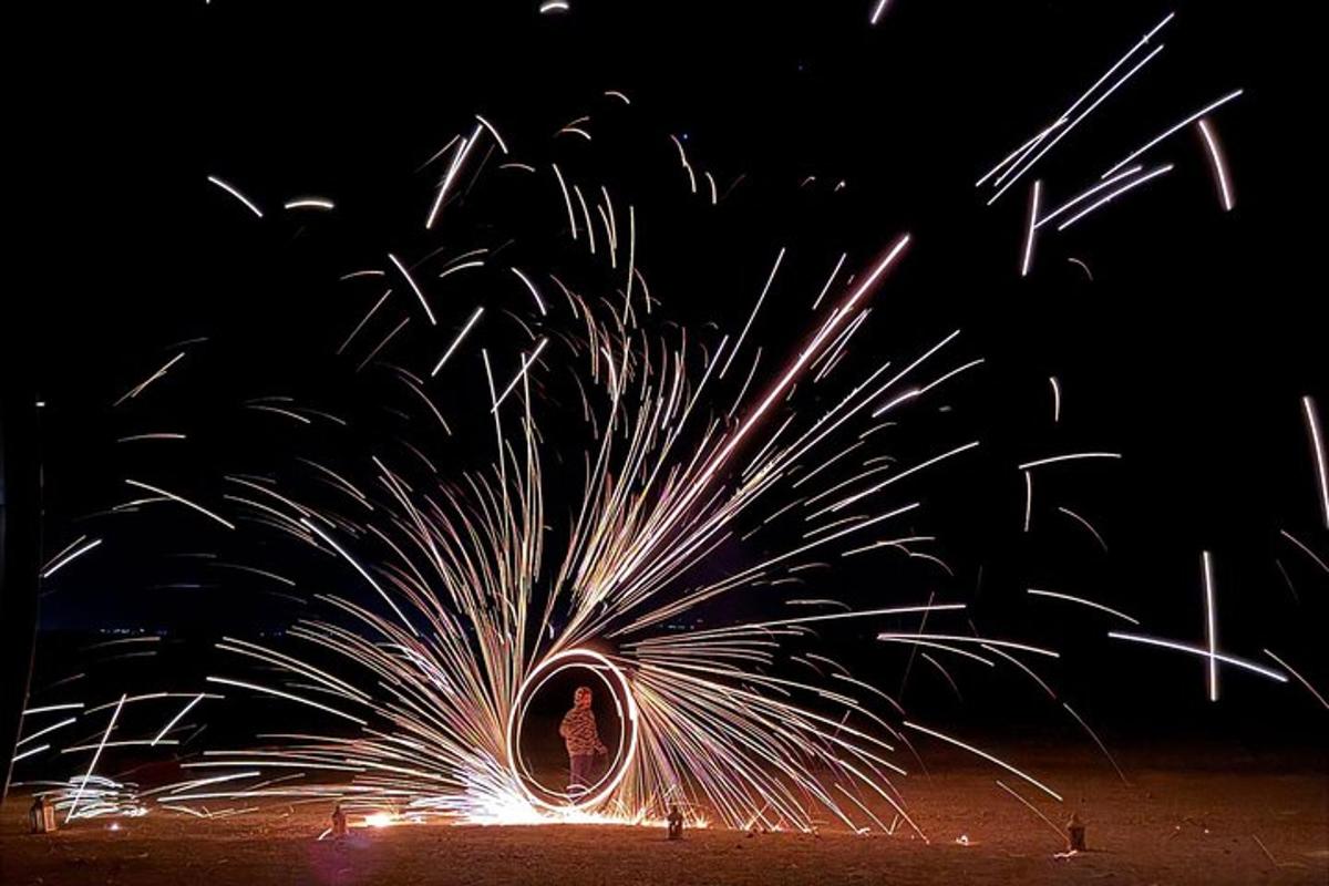 a firework display in the sky at night