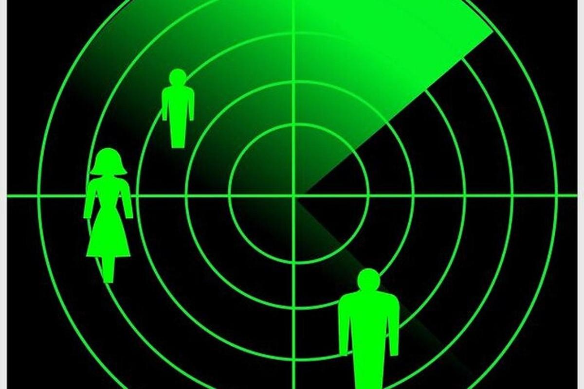 a green circle with two people in it