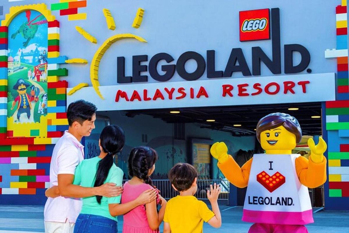 a group of people standing in front of a lego island sign