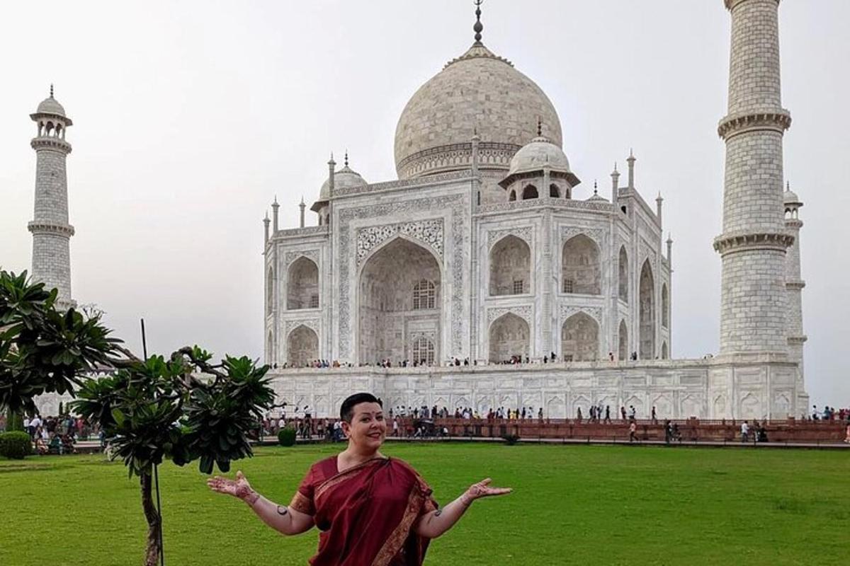 a woman standing in front of a building