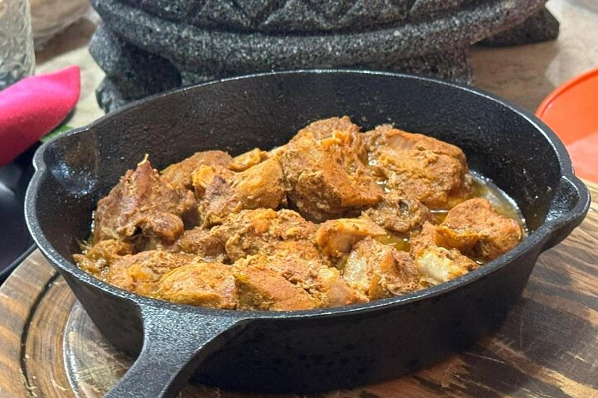 a pan filled with food on top of a table