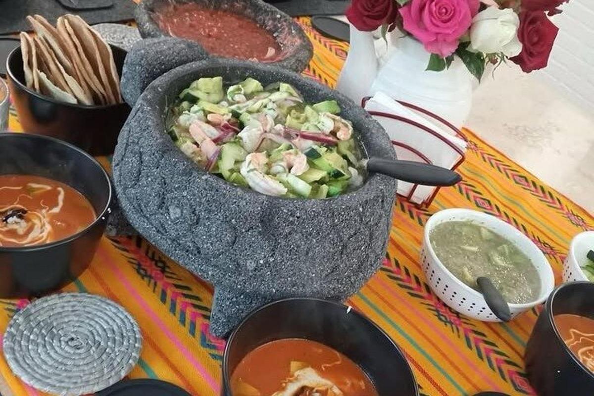 a bowl of food on a table with soup