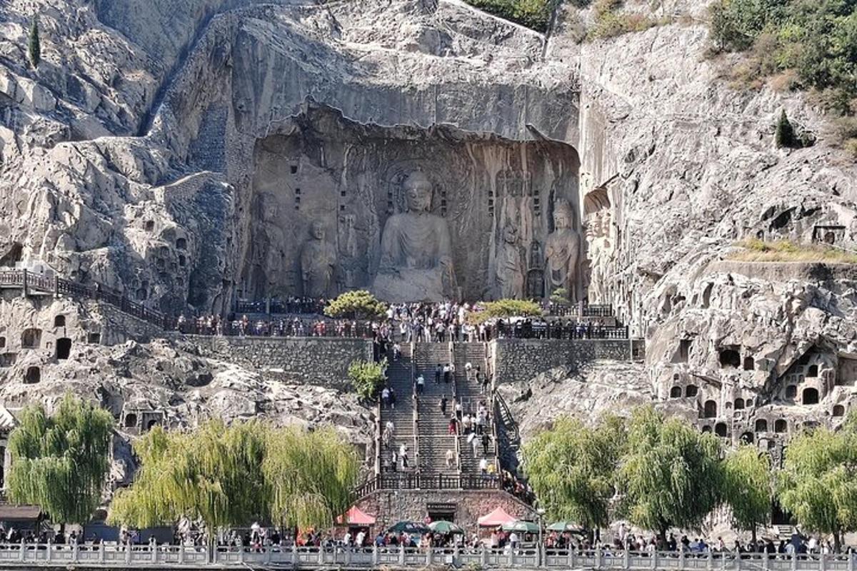 a large statue on the side of a mountain