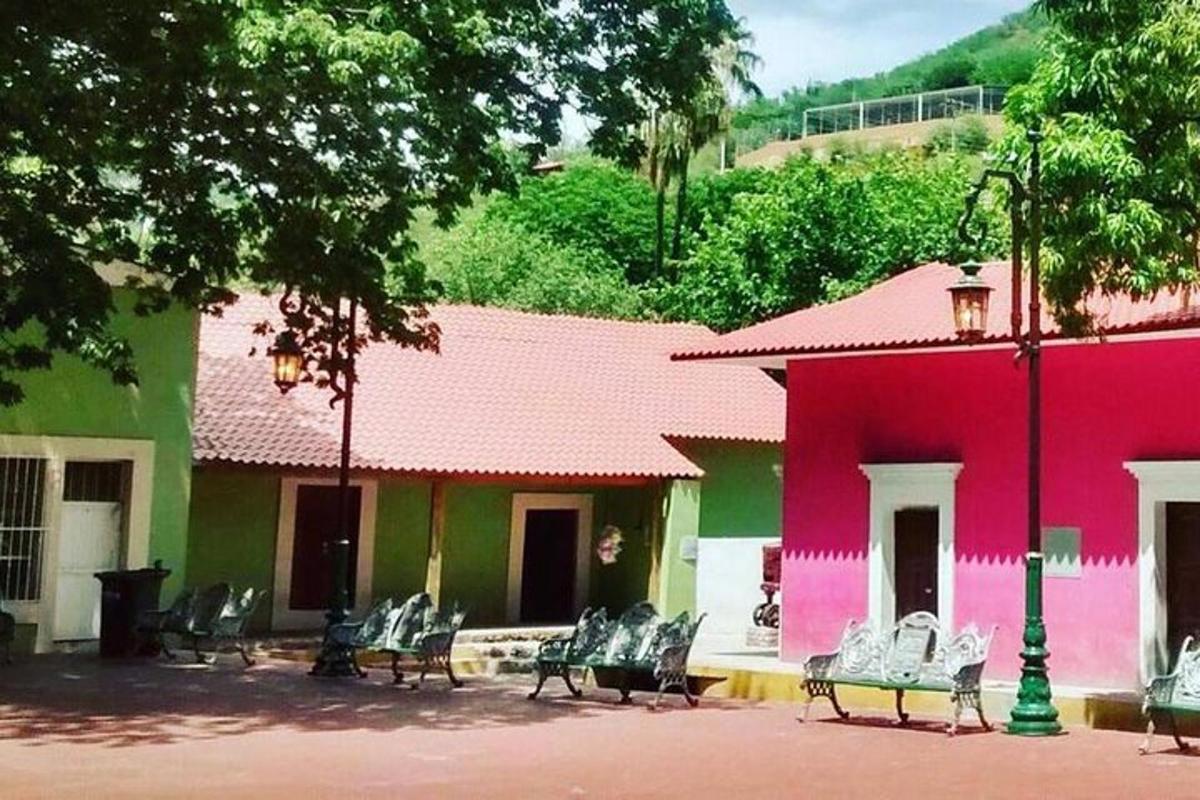 a group of chairs sitting in front of a building