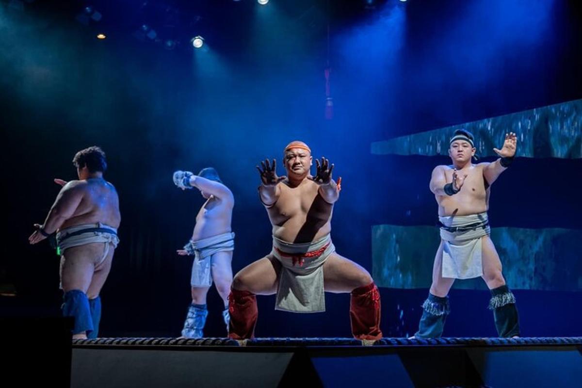a group of men standing on a stage
