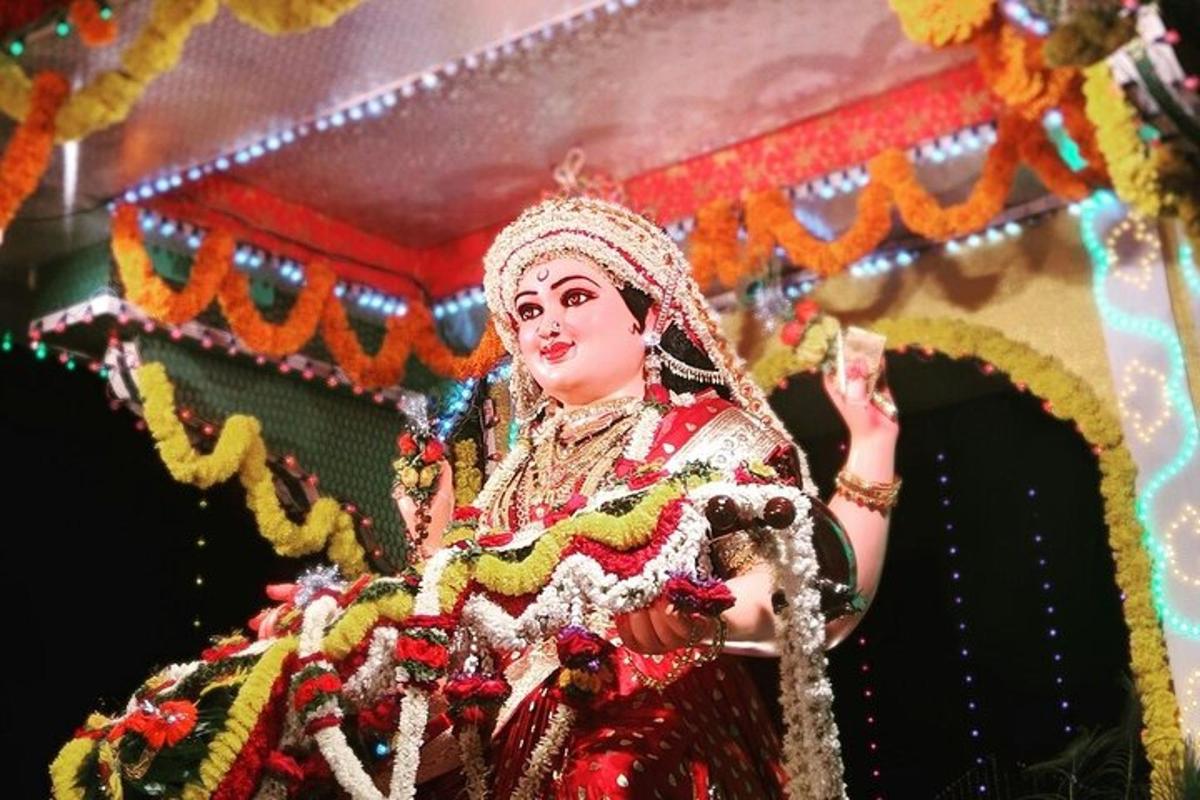 a woman dressed up in a costume on a float