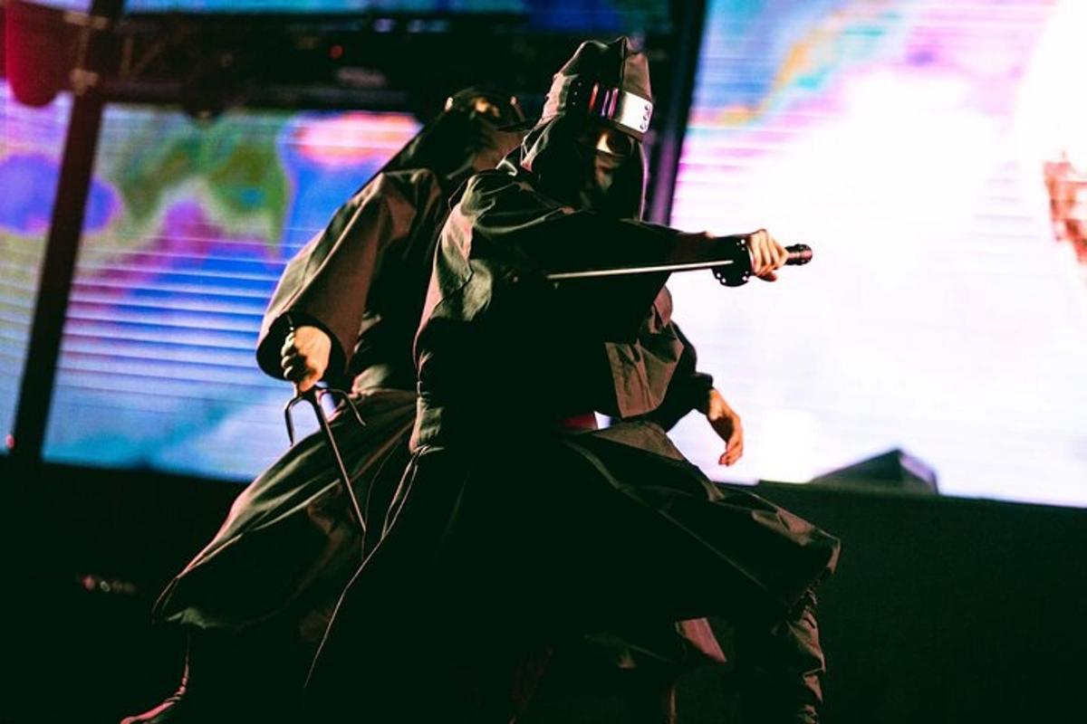 two people in samurai costumes on a stage