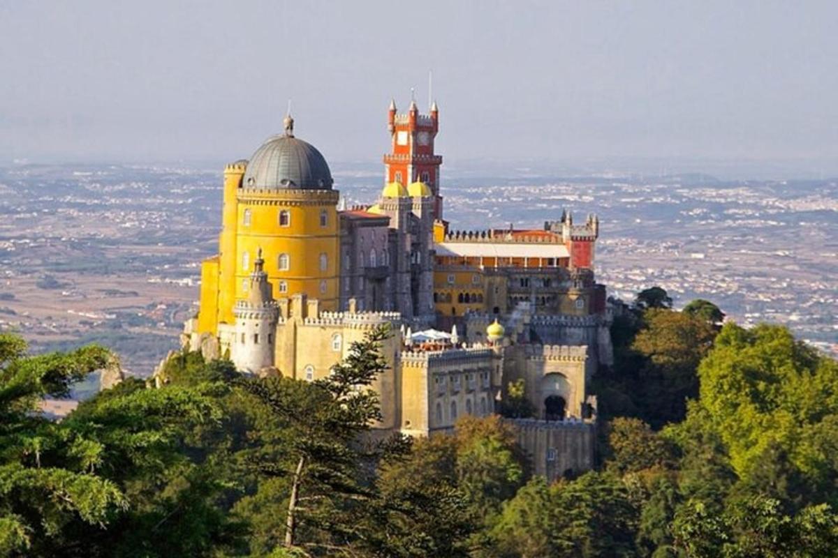 a castle sitting on top of a hill
