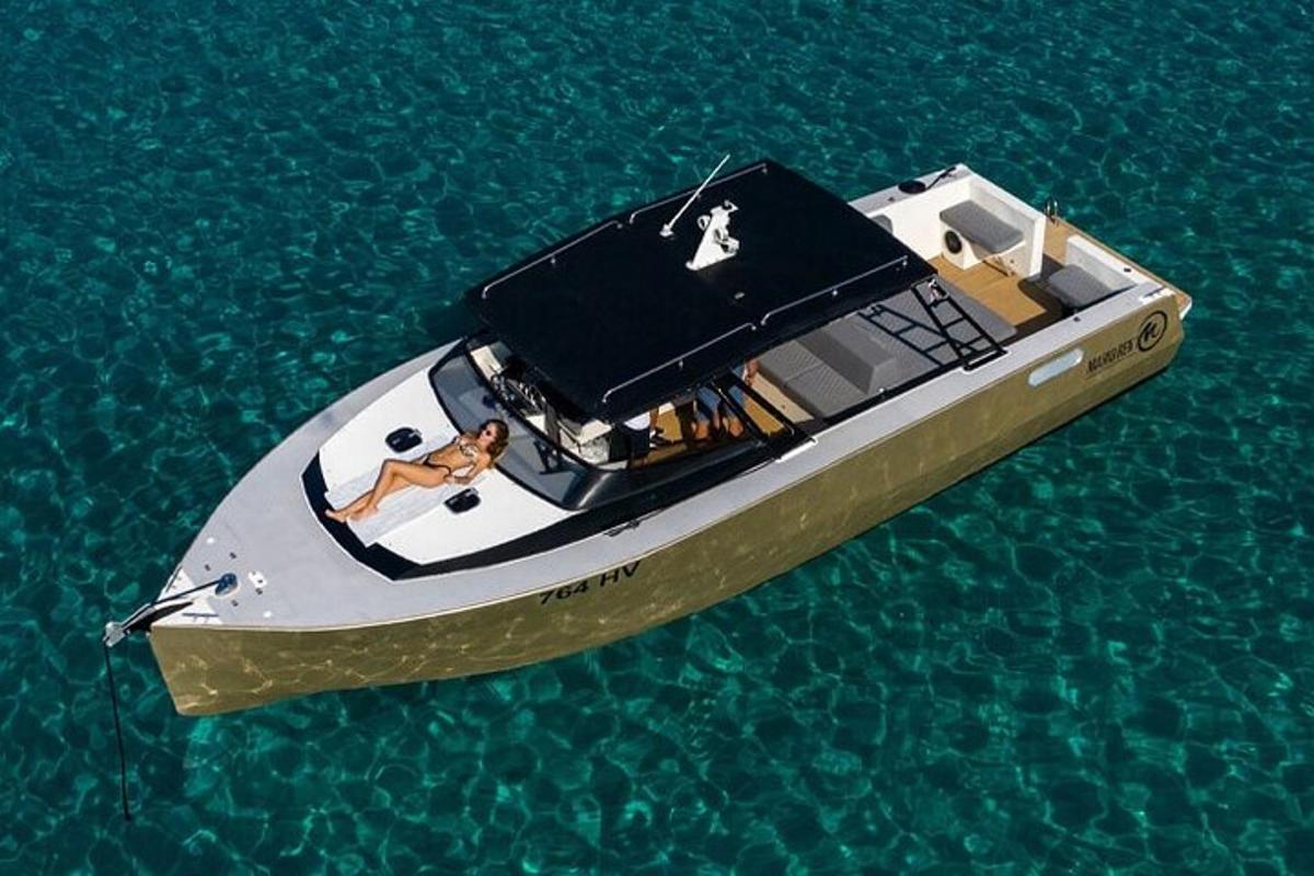 a boat in the water with two people on it