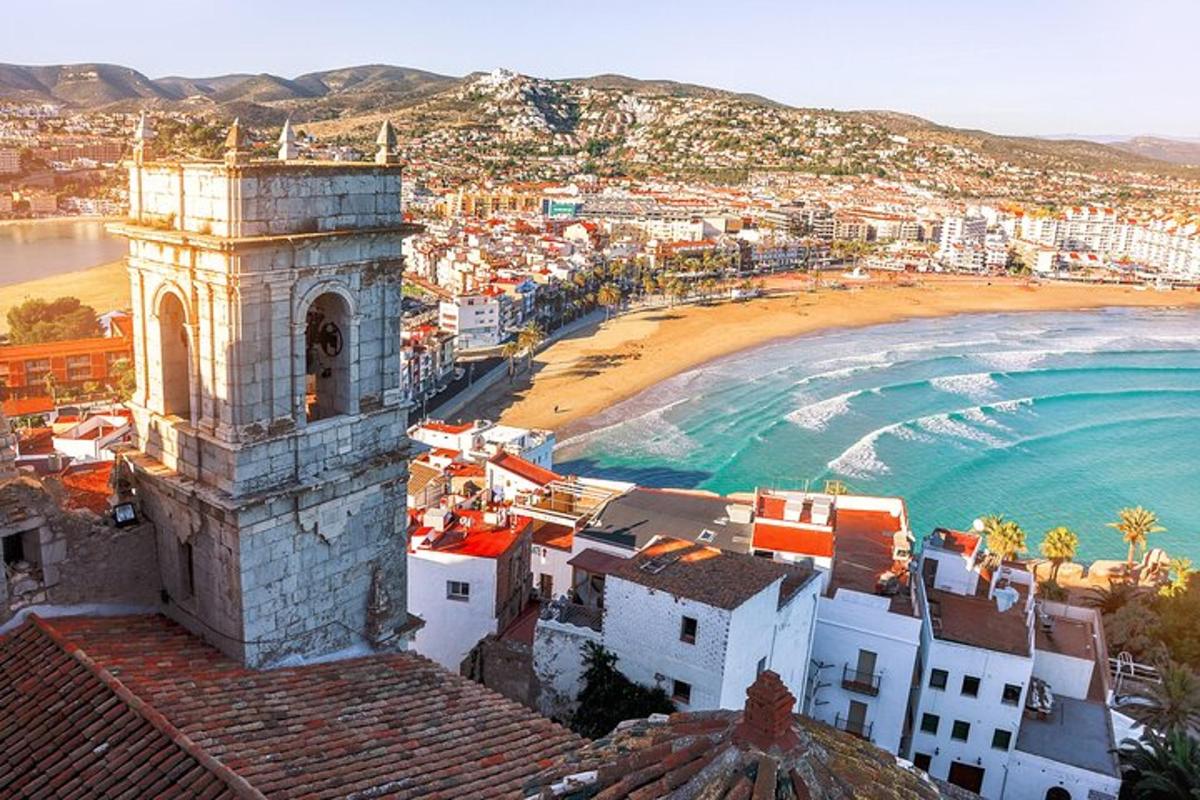 an aerial view of a city and a beach