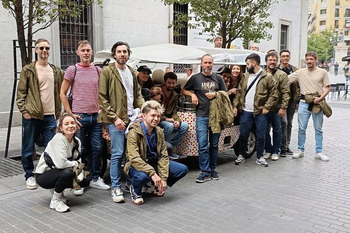 a group of people are posing for a picture