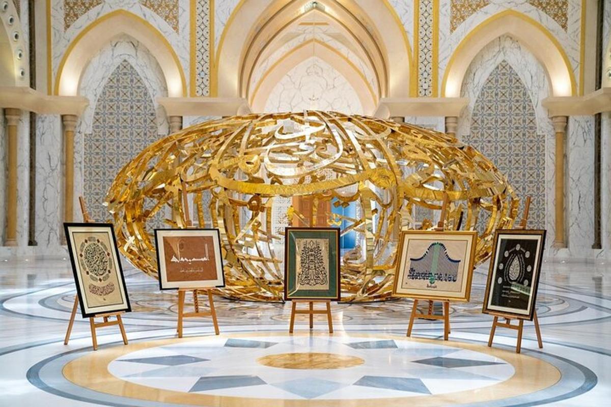 a large gold exhibit in a room with pictures
