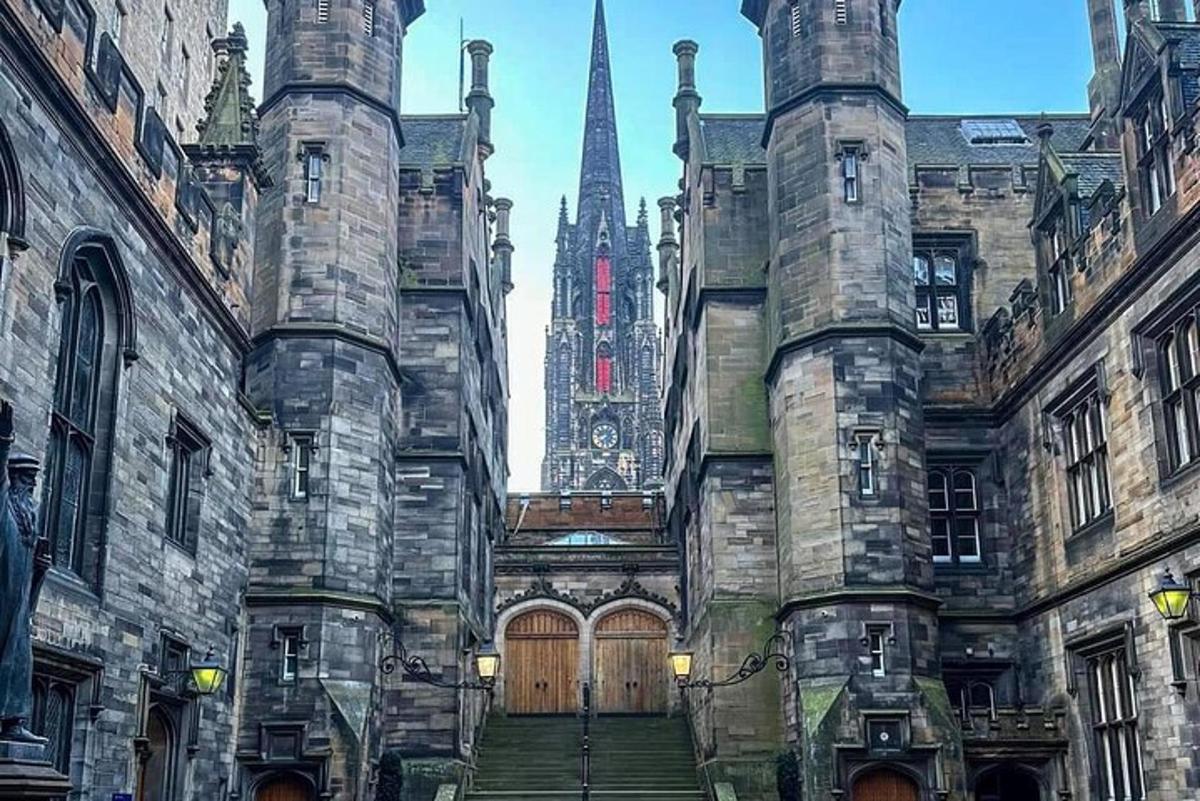 an old building with a spire in the background