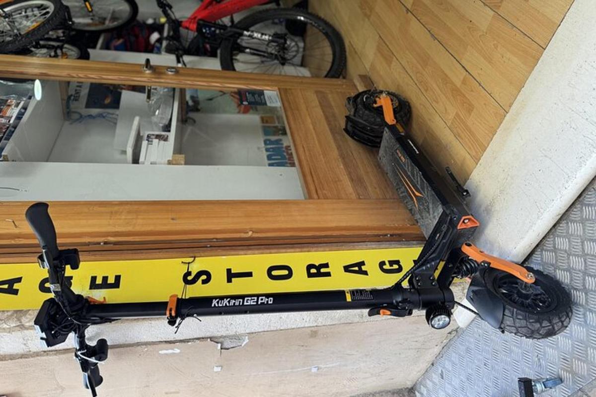 a tool cart in a room with a mirror
