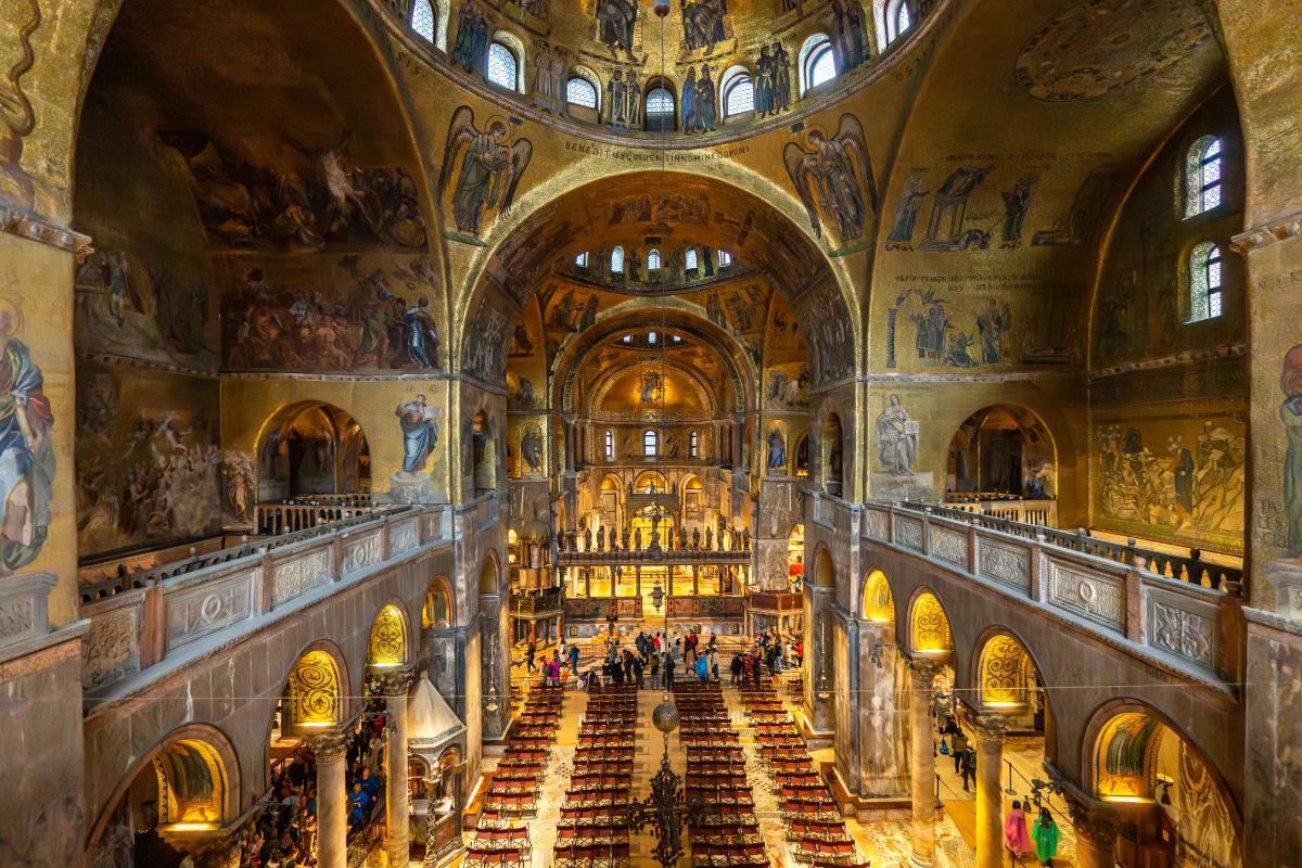 an image of the inside of a church with paintings on the ceilings