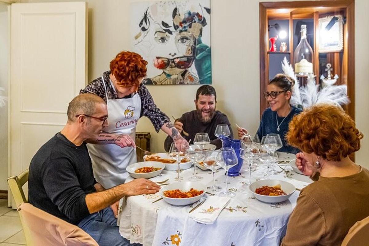 a group of people sitting around a table eating food