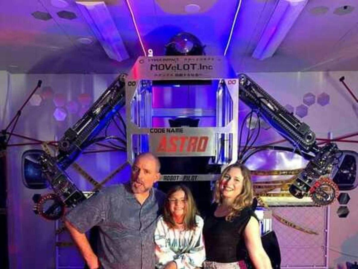 a group of people standing in front of a fire truck