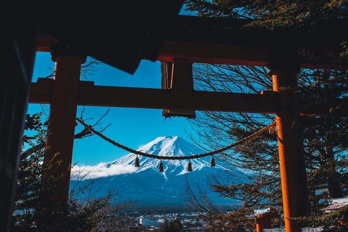 a view of a snow covered mountain in the sky