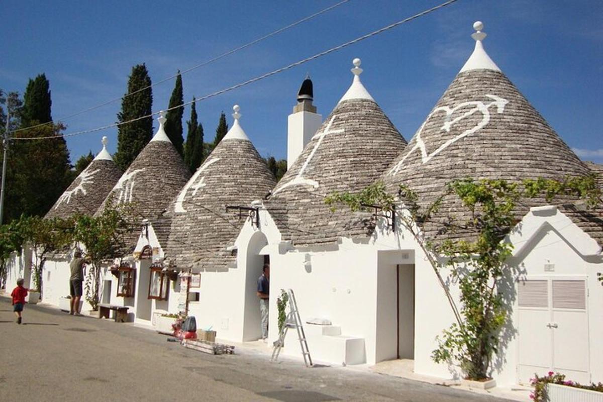 a building with a tiled roof on a street