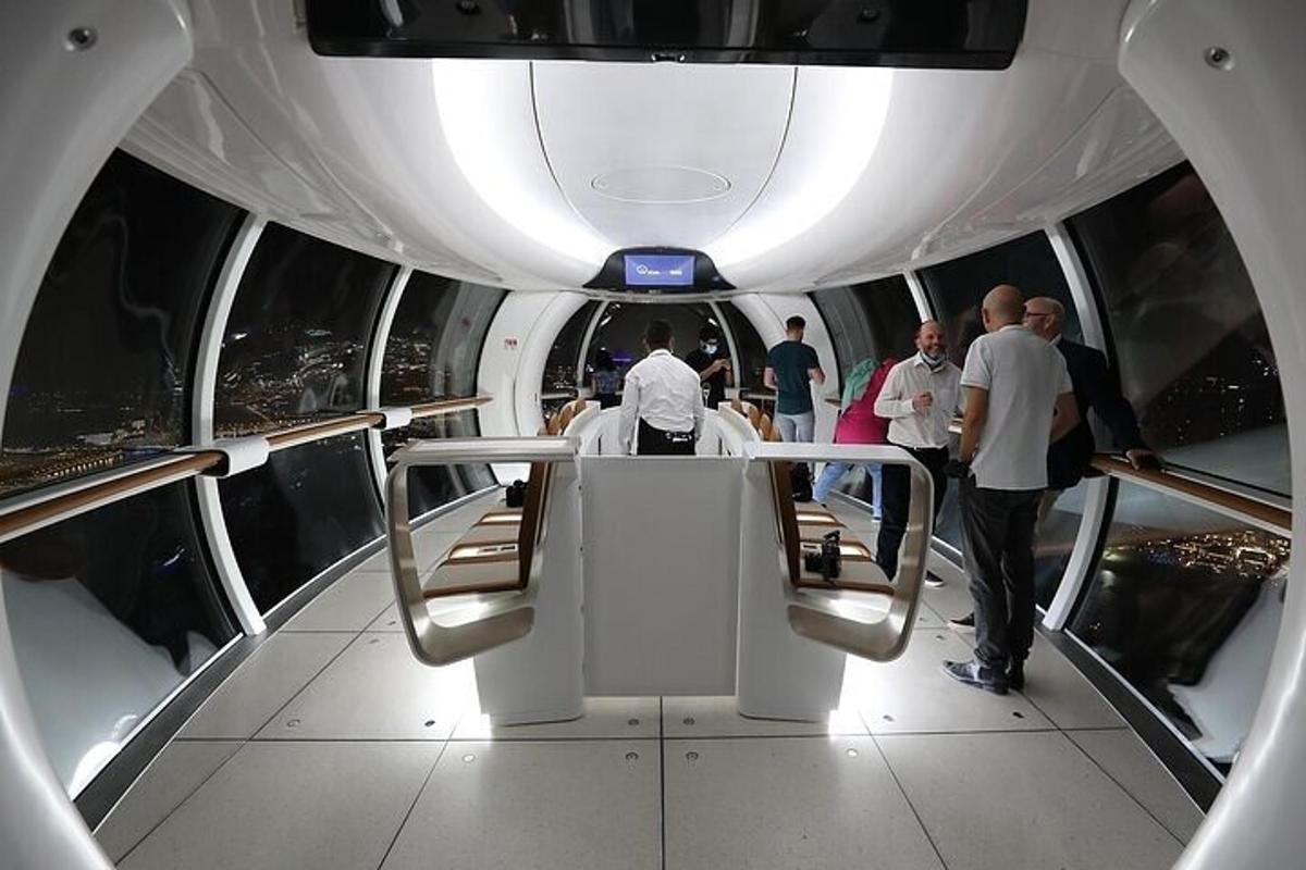 a group of people standing around a table in an airplane