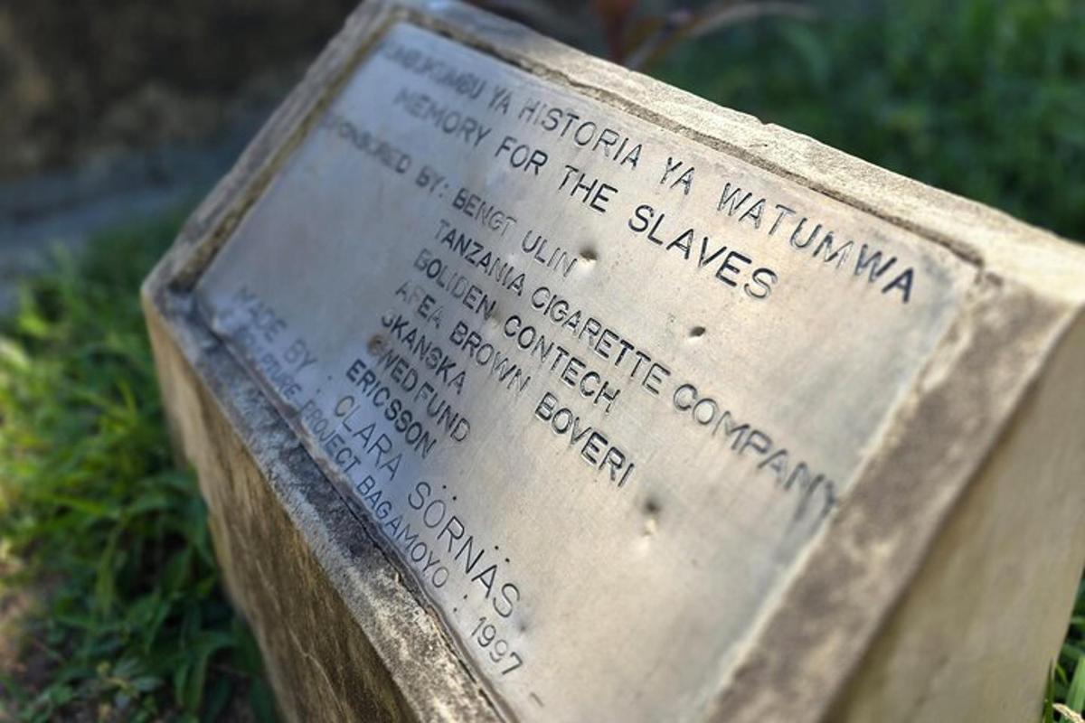 a memorial plaque for the victims of a shooting
