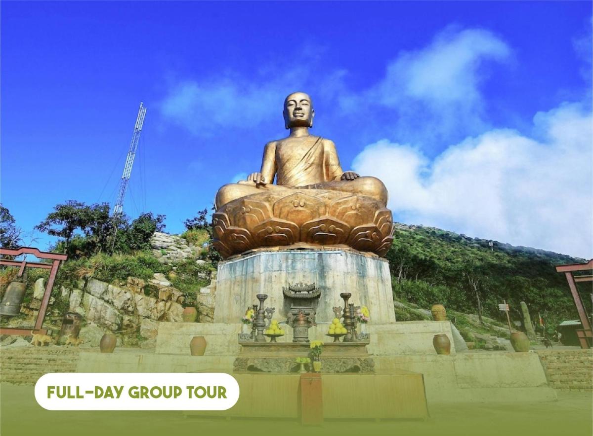 a large statue of a buddha sitting on top